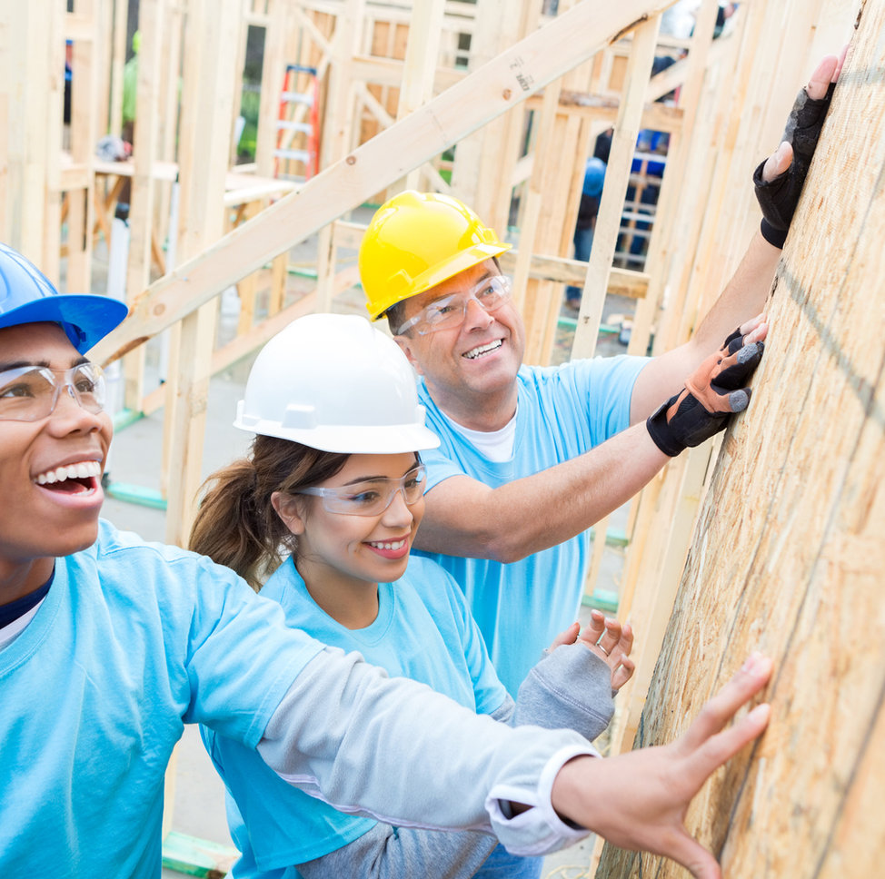 Habitat volunteers building